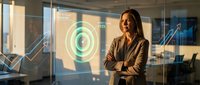 Professional businesswoman presenting data analytics dashboard with circular charts in modern office conference room during golden hour lighting.