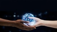 Diverse hands holding glowing digital globe against dark background, representing global connection, teamwork, and international collaboration for business and technology concepts.