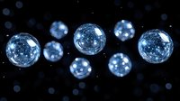 Glowing blue energy spheres with sparkling lights floating in dark space creating magical sci-fi atmosphere for digital art and fantasy designs.