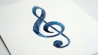 Treble clef symbol painted in blue watercolor on white paper, isolated and ready for music education, design projects, and creative compositions.