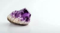 Raw amethyst crystal cluster with deep purple color gradients and white quartz base on neutral background, showcasing natural geometric formation and mineral structure.
