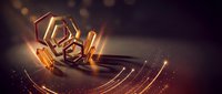 Golden hexagonal geometric shapes floating with glowing light effects and particle trails on dark background for modern digital design projects.