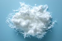 White milk or cream splash explosion with dynamic liquid drops and splashes against light blue background, frozen motion photography for dairy products.