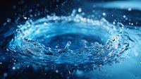 Dynamic splash of crystal clear water creating circular ripples and droplets against dark blue background with bokeh effect, captured in macro photography.