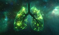 Glowing green human lungs filled with cosmic nebula and stars against dark space background, representing breath of universe and life force energy.