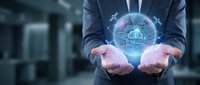 Businessman holding glowing artificial intelligence brain with circuit patterns in cupped hands representing machine learning and neural network technology.