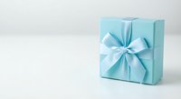 Elegant turquoise gift box with satin ribbon bow on clean white background for special occasions, holidays, birthdays and celebrations.