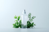 Clear glass bottle with natural serum surrounded by fresh green leaves and herbs on light background, minimalist skincare composition for beauty products.