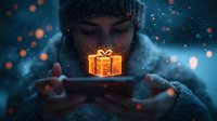 Young Asian woman holding smartphone with glowing gift box hologram in winter night, magical bokeh lights create festive atmosphere. Perfect for holiday marketing.