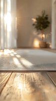 Sunlight streaming through window onto yoga mat in serene home space with potted plant and warm wooden flooring.
