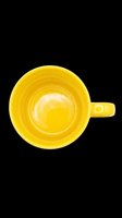 Yellow ceramic coffee mug top view, isolated on transparent background. Ready for clipart, stickers, print on demand, sublimation, and t-shirt design use.