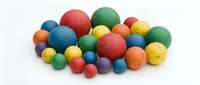 Colorful rubber balls in various sizes isolated on white background, ready for design projects, educational materials, toy packaging, and children's product illustrations.