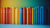 Colorful hardcover books arranged in a row displaying a rainbow spectrum of spines, suitable for education, library, and publishing design projects.