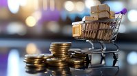 Shopping cart filled with cardboard boxes next to stacks of gold coins on reflective surface against blurred bokeh background, representing e-commerce and online shopping costs.