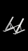 Adjustable aluminum laptop stand isolated on transparent background, ready for sublimation, print-on-demand products, and design applications.