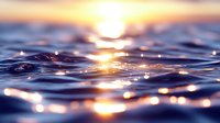 Ocean waves at sunset with golden light reflections creating sparkling water surface and warm sky colors in peaceful seascape scene.