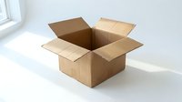 Open cardboard box with flaps spread wide on white surface, ready for packing, shipping, or storage solutions.