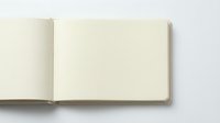 Open blank notebook with cream pages and brown cover on white background for mockup design projects.