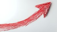 Red sketchy arrow pointing upward on white background, indicating growth, success, and positive direction. Isolated design element for business presentations and infographics.