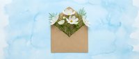Kraft paper envelope filled with white flowers and green foliage on soft blue watercolor background for spring greeting cards and wedding invitations.