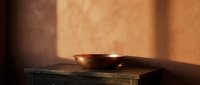 Copper bowl on wooden table with warm sunlight casting shadows on terracotta wall, minimalist still life composition for interior design and home decor projects.