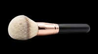 Makeup brush with soft natural bristles, rose gold ferrule and black handle, isolated on transparent background. Ready for beauty product design, cosmetics packaging, print-on-demand and digital art projects.