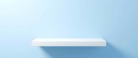 Empty white shelf mounted on light blue wall with soft shadow beneath, suitable for product display, interior design, and retail mockup applications.