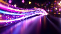 Glowing neon light trails with sparkles and bokeh effects create dynamic motion streaks against dark background, reflecting on glossy surface in purple and blue tones.