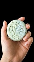 Spa skincare product with leaf design held in hand, isolated on transparent background. Ready for cosmetics packaging, beauty product marketing, wellness branding, print-on-demand designs, and digital beauty content.