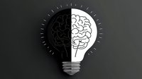 Creative brain lightbulb concept showing split design with dark and bright sides representing innovation, knowledge and inspiration for business solutions.