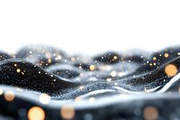 Abstract winter landscape with glowing bokeh lights and flowing snow particles creating magical waves against dark background. Festive seasonal backdrop.