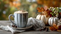 Cozy autumn coffee with whipped cream and cinnamon on rustic wooden table with white pumpkins, fall leaves, and berries in background.