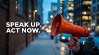 Red megaphone held by hand with motivational text overlay against blurred urban evening cityscape background for activism and social awareness campaigns.