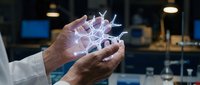 Scientist hands holding glowing neural network hologram in modern laboratory. Digital brain connections and artificial intelligence visualization for medical research.