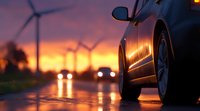 Modern car on wet asphalt road at dramatic sunset with wind turbines and approaching vehicle headlights reflecting on rainy surface during golden hour.