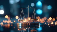 Scales of justice on metallic podium against blurred bokeh lights background, symbolizing law, balance and legal system in modern representation.
