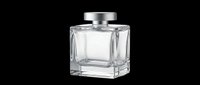 Elegant square glass perfume bottle with silver metallic cap, isolated on transparent background. Ready for design use on product packaging, e-commerce, sublimation, print-on-demand, and digital marketing materials.