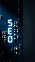 Blue circuit board with glowing white LED display showing numbers, electronic components and microchips for technology and computing projects.