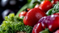 Fresh red radishes with water droplets arranged on vibrant green leafy vegetables, suitable for culinary, healthy eating, and food styling projects.