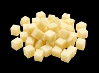 Diced cheese cubes pile isolated on transparent background, ready for food design, stickers, print on demand, T-shirt design, clipart, and sublimation projects.