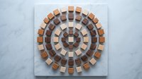 Wooden blocks arranged in concentric circles creating geometric spiral pattern on white canvas, perfect for modern interior design and wall art decoration.