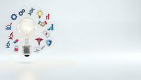 Light bulb surrounded by colorful medical and healthcare icons on white background representing innovation in medicine and health technology solutions.