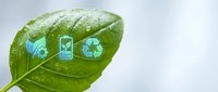 Green leaf with eco-friendly icons showing recycling, energy and environmental symbols for sustainable business concepts and green technology solutions.