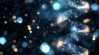 Magical glowing blue and gold bokeh lights with sparkle effects on dark background, creating dreamy celestial atmosphere for festive designs.