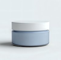 Minimalist cosmetic jar with white lid and light blue glass container on white background, isolated product mockup for beauty and skincare packaging design.