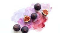 Fresh figs on watercolor splash background for culinary design and healthy food concepts.