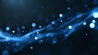 Glowing blue bokeh lights with flowing energy wave effect on dark background creates magical atmosphere for technology and science designs.