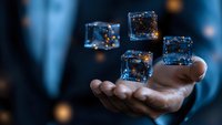 Businessman hand holding floating glowing digital cubes with network connections representing blockchain technology and data innovation.