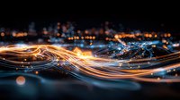 Glowing orange and blue light trails creating dynamic waves against dark background with bokeh effects, representing digital connectivity and data flow.