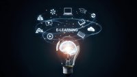 Glowing lightbulb with e-learning icons and educational symbols floating above on dark background representing online education and digital learning concepts.